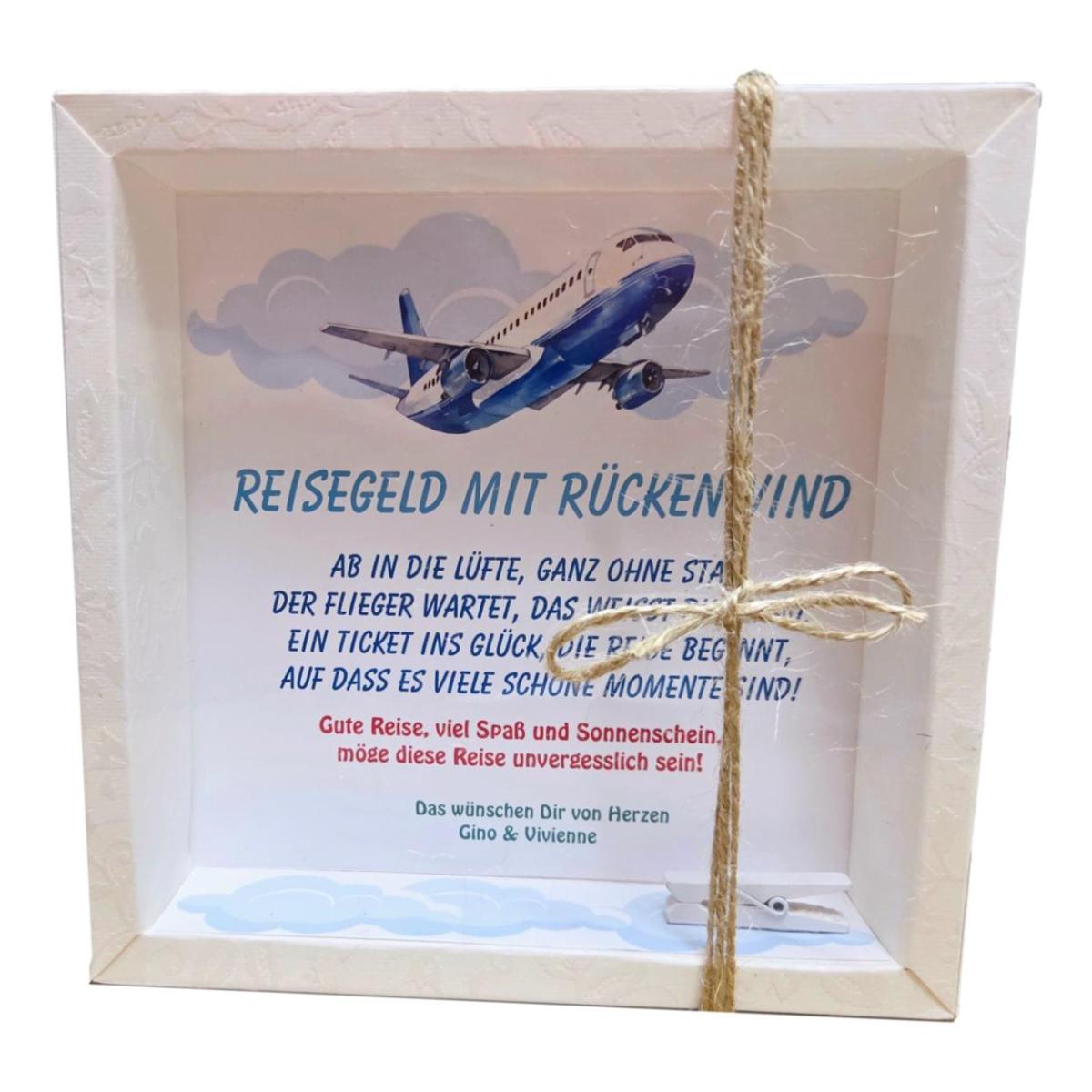 Geldgeschenk Reise Urlaub – weiße Geschenkbox mit Flugzeug-Motiv und Klammer für Geldschein